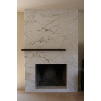 calacatta gold marble fireplace