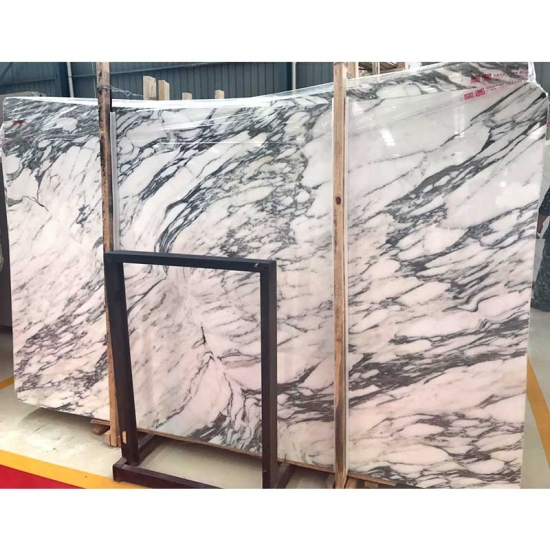 Saw cutting Arabescato marble tiles