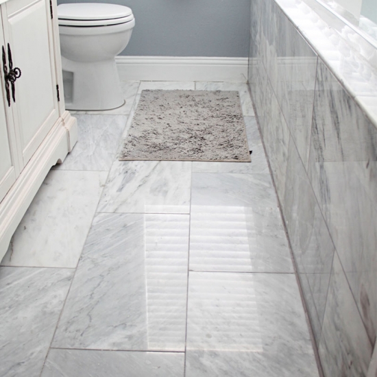 carrara marble tile bathroom